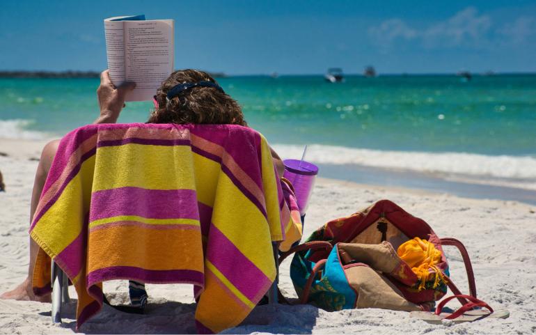 A person enjoying a beach vacation without digital distraction