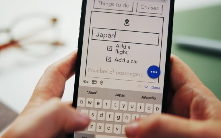 Traveller making flight and hotel bookings for Japan