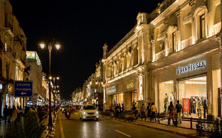 Street view of Hazratganj lit at night
