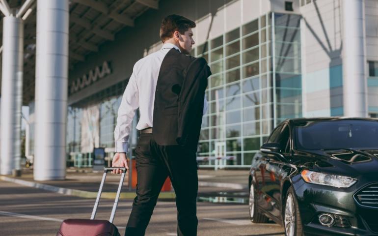 A businessman entering the airport
Image credit: Shutterstock/ViDI Studio