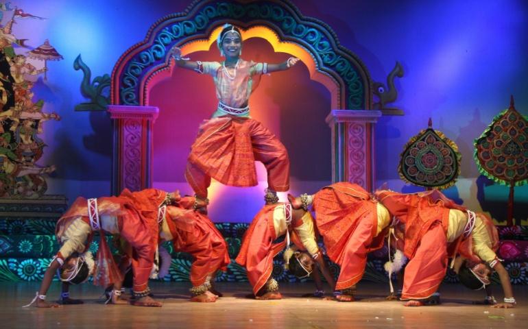 A group male dancers performing Gotipua dance