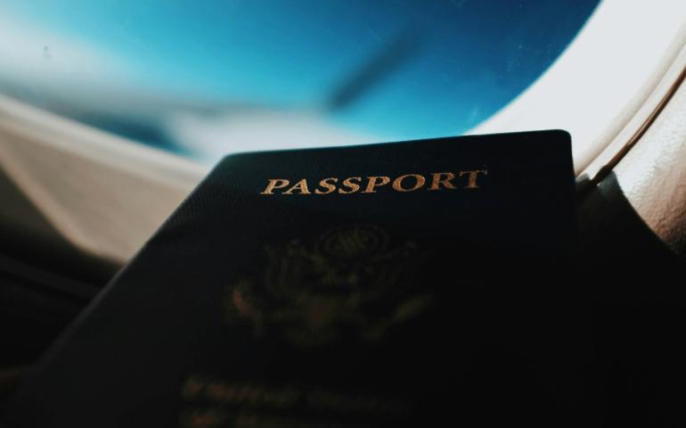 Silhouette of Passport Booklet with Airplane Window