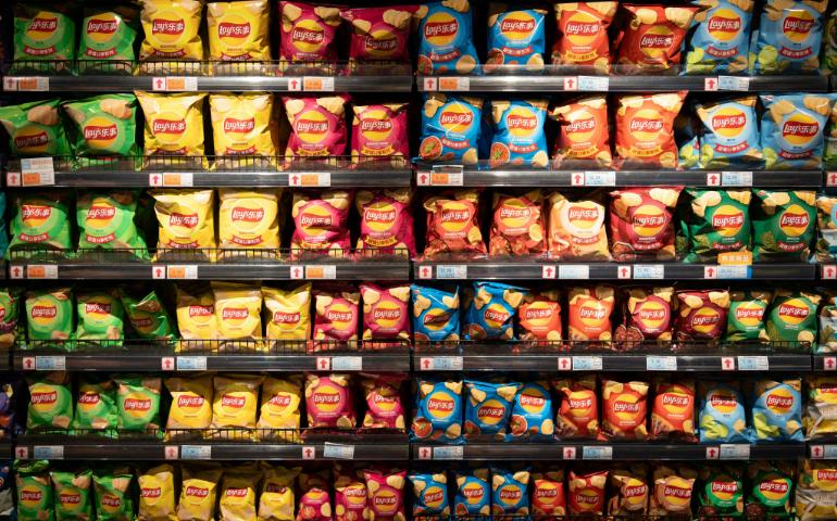A wall of chips in a supermarket