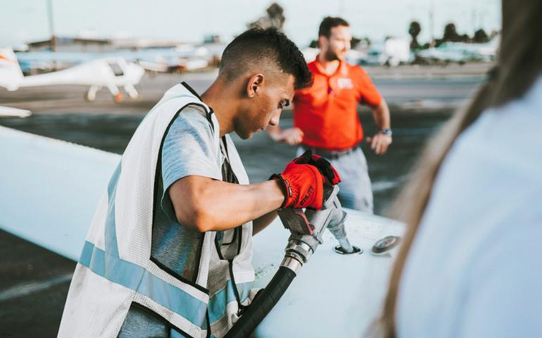 Man fueling the plane
