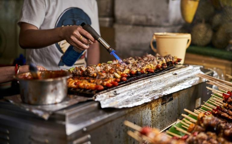 Street Food Barbecue at a Night Market in Bangkok