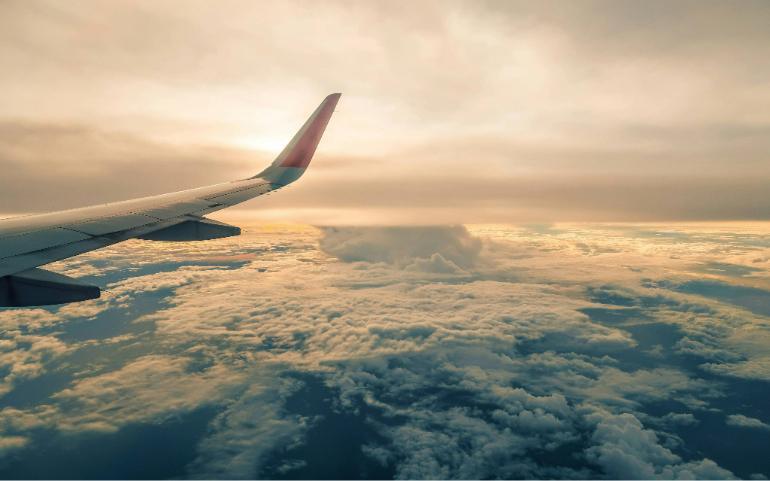 A Wing Of the Airplane in the Sky
