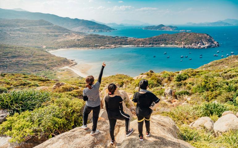 Group of girls enjoying trekking in Vietnam
