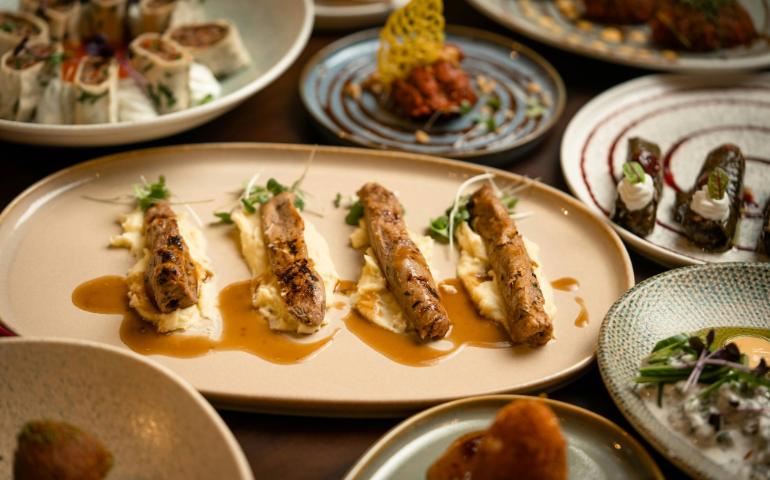 Elegant presentation of a variety of dishes on a dining table.