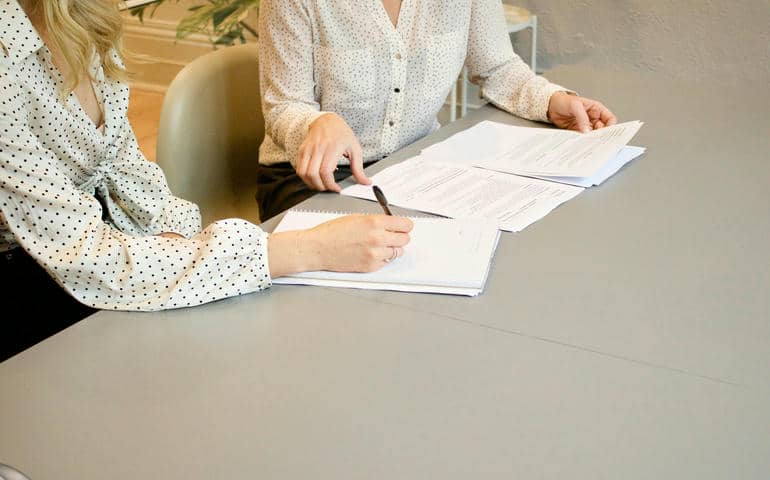 A person signing documents