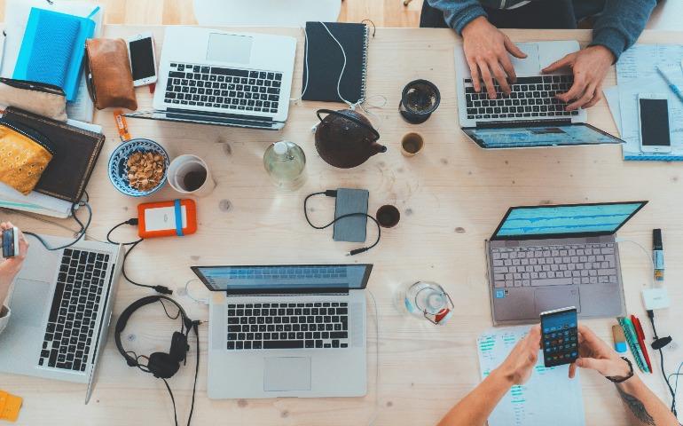 People using electronic gadgets for work