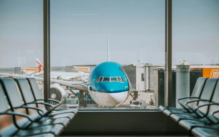 An airplane parked near passenger getaway