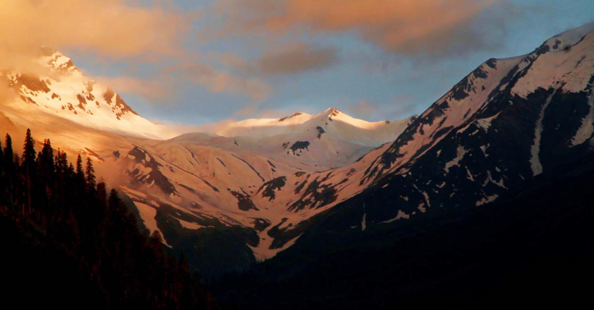 stunning view of snow-capped mountains illuminated by sunset hues,
Chattrapal (Shitij) Singh/Pexels