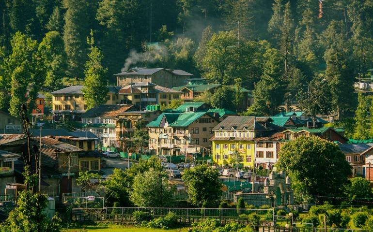 Charming Village in Pahalgam Surrounded by Lush Greenery