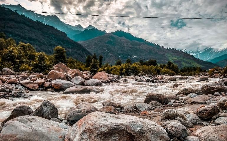 Mountain River Flowing Through Rocks