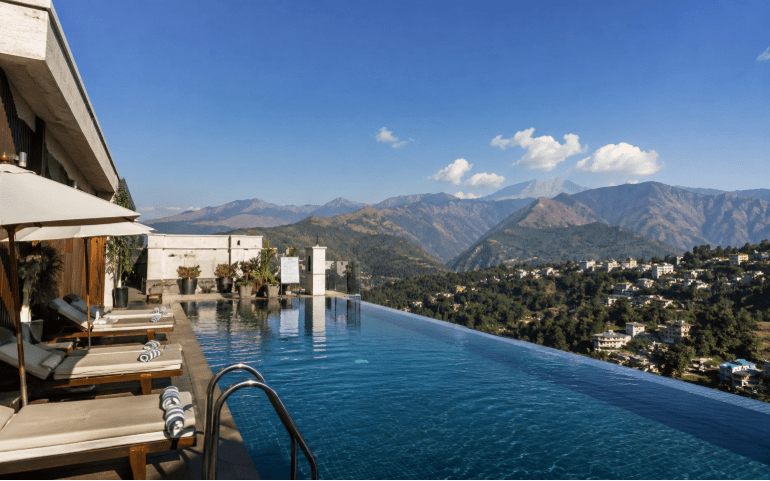 Rooftop infinity pool with mountain views
AI-generated image for representational purposes only