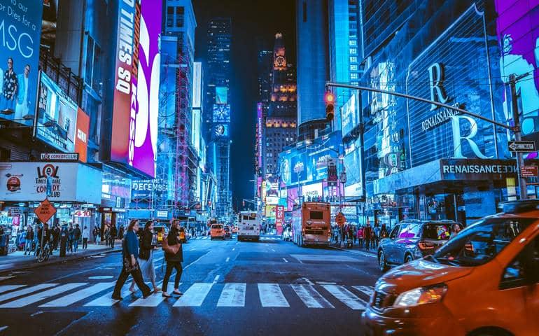 Times Square in New York City at night.
