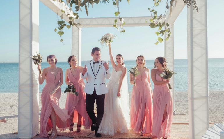 Bride and Groom posing for a photo