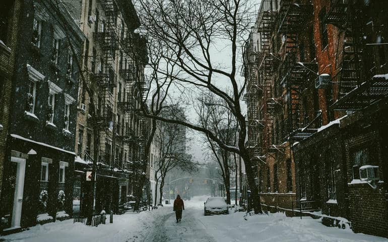 Person walks west village street