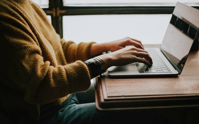 A man working on his laptop
