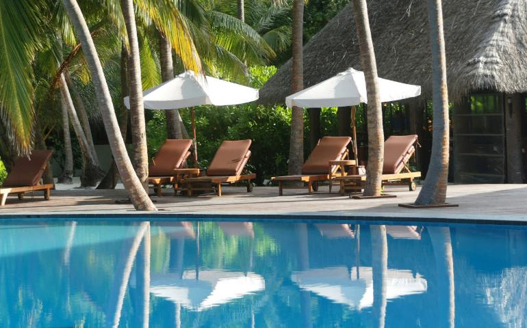 A tropical poolside on the islands of the Maldives