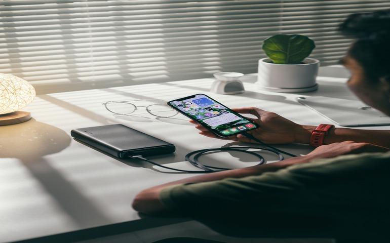 Person has connected power bank to his phone
