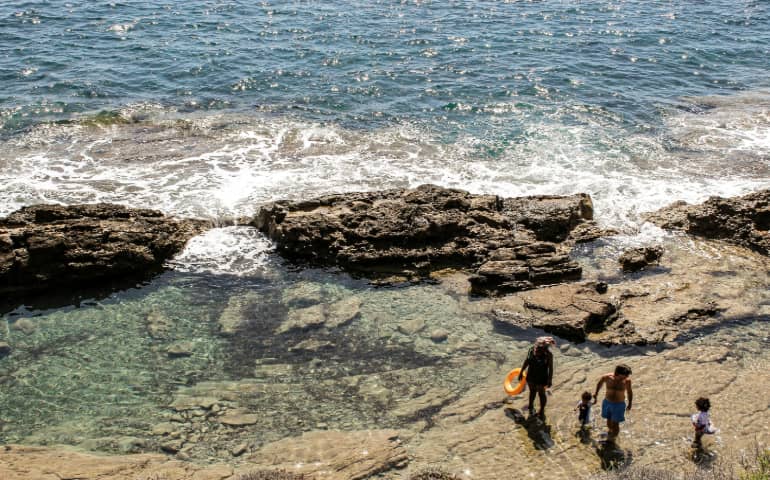 A family enjoying on the beach in Dénia, Spain.
