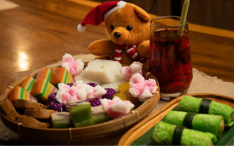 Traditional desserts and a cute teddy bear