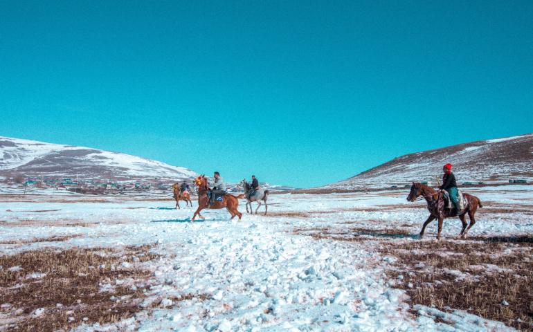 People Enjoying a Pony Ride In Sonamarg
