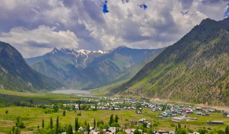 Valley with mountains and village in summer.
Image Credit: Imad Clicks/Pexels