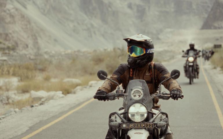 Motorcyclists traverse a rugged landscape on an adventurous Leh Ladakh road trip