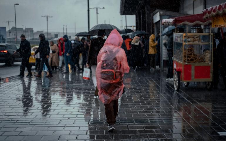 A person walking in the rain