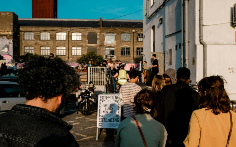 People forming a queue outside CRATE Brewery & Pizzeria