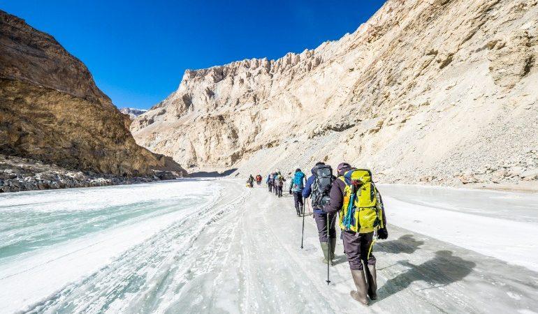Backpacker tourists with hiking on Frozen Zanskar River, at Leh Ladakh, India.
Image Credit: Kittima05/Shutterstock