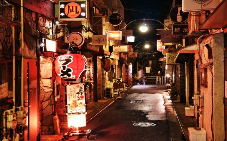 Narrow streets of Golden Gai restaurant area in Tokyo, Japan.