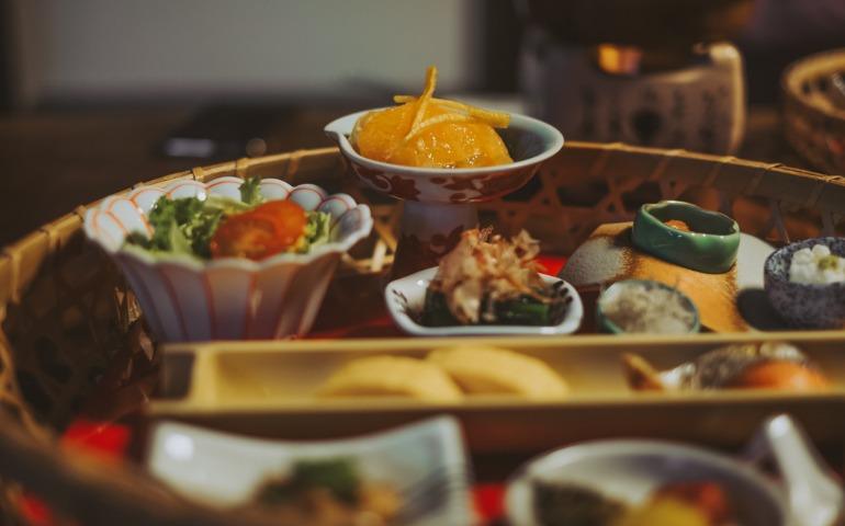 A Japanese gourmet kaiseki dinner made of many small dishes, served in a traditional hotel Ryokan