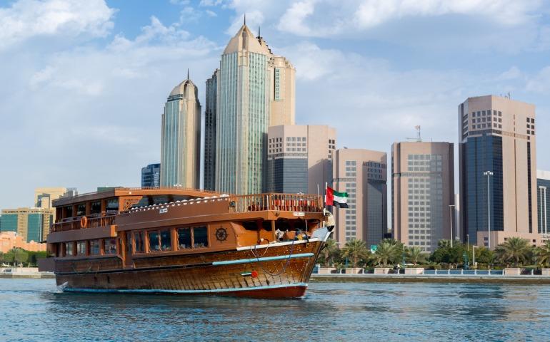 Abu Dhabi Dhow Cruise with skyline background  