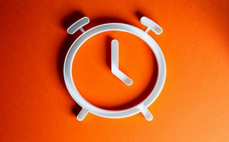 Watch on orange background