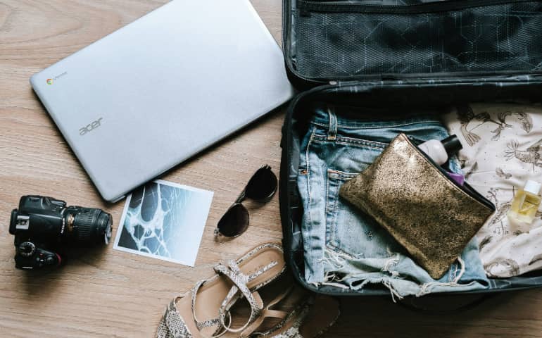 Packing for a trip with travel essentials