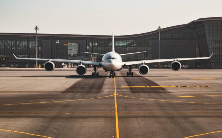 White airplane ready to take off