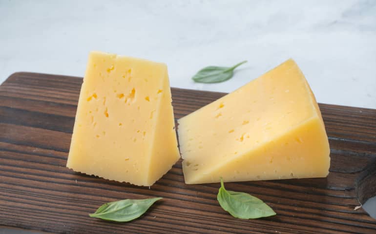 A couple of pieces of cheese
