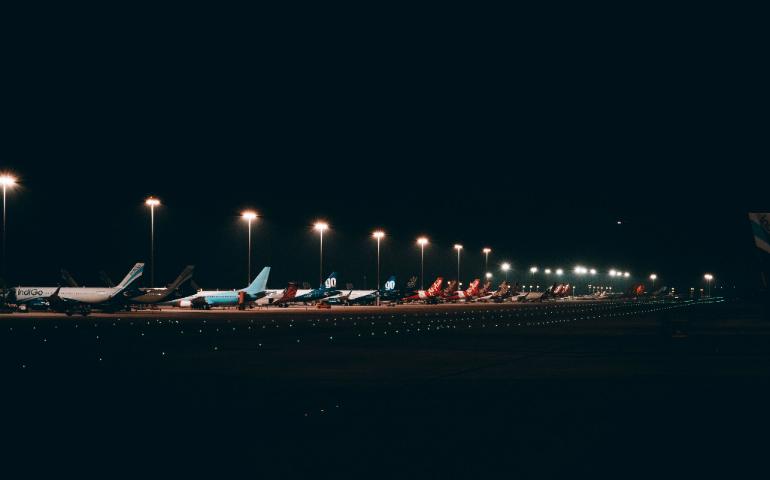 Flights Parked At The Airport At Night
Image Credit: Divyadarshi Acharya/Unsplash