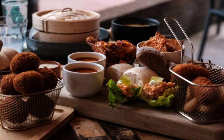 A table topped with famous Netherland food and coffee