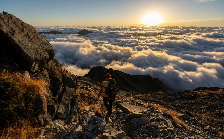 Person hiking in the mountains