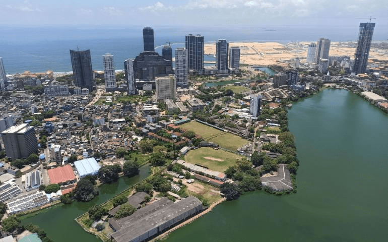 Stunning aerial view capturing Colombo’s skyline, oceanfront, and Beira Lake.
Image Credit: Isuru Abeysundar/Pexels