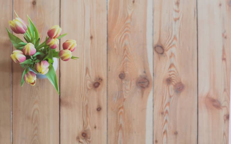 Wooden tulips on a wooden table