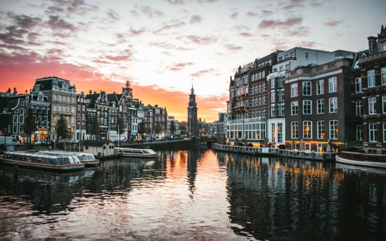 Sunset over Muntplein in Amsterdam.
