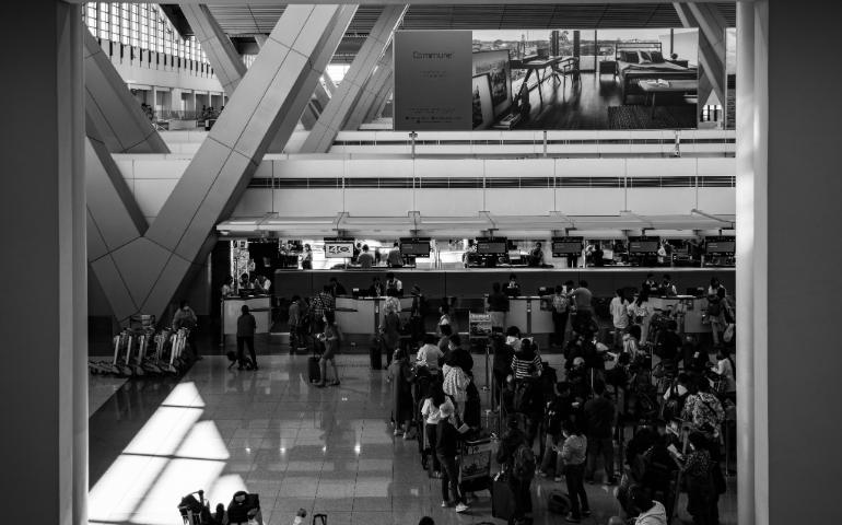 Travellers in line at check-in counters
Image Credit - Earl Andre Roca/Pexels