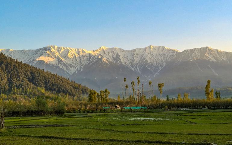 Beautiful sunrise view of snow-capped mountains.