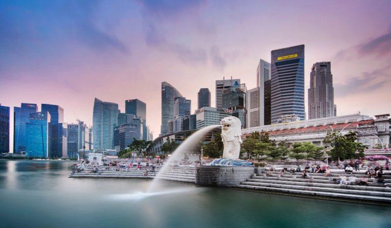 View of Singapore's skyline featuring the famous Merlion fountain at dusk

Irene K/Pexels