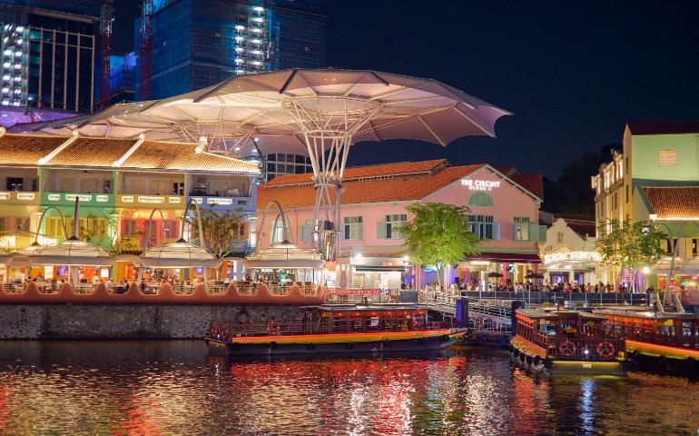 Colorful waterfront nightlife at Clarke Quay, Singapore.